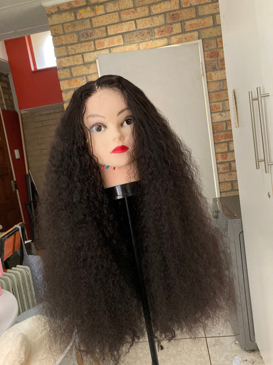 5x5 closure. Black deep wave curls.