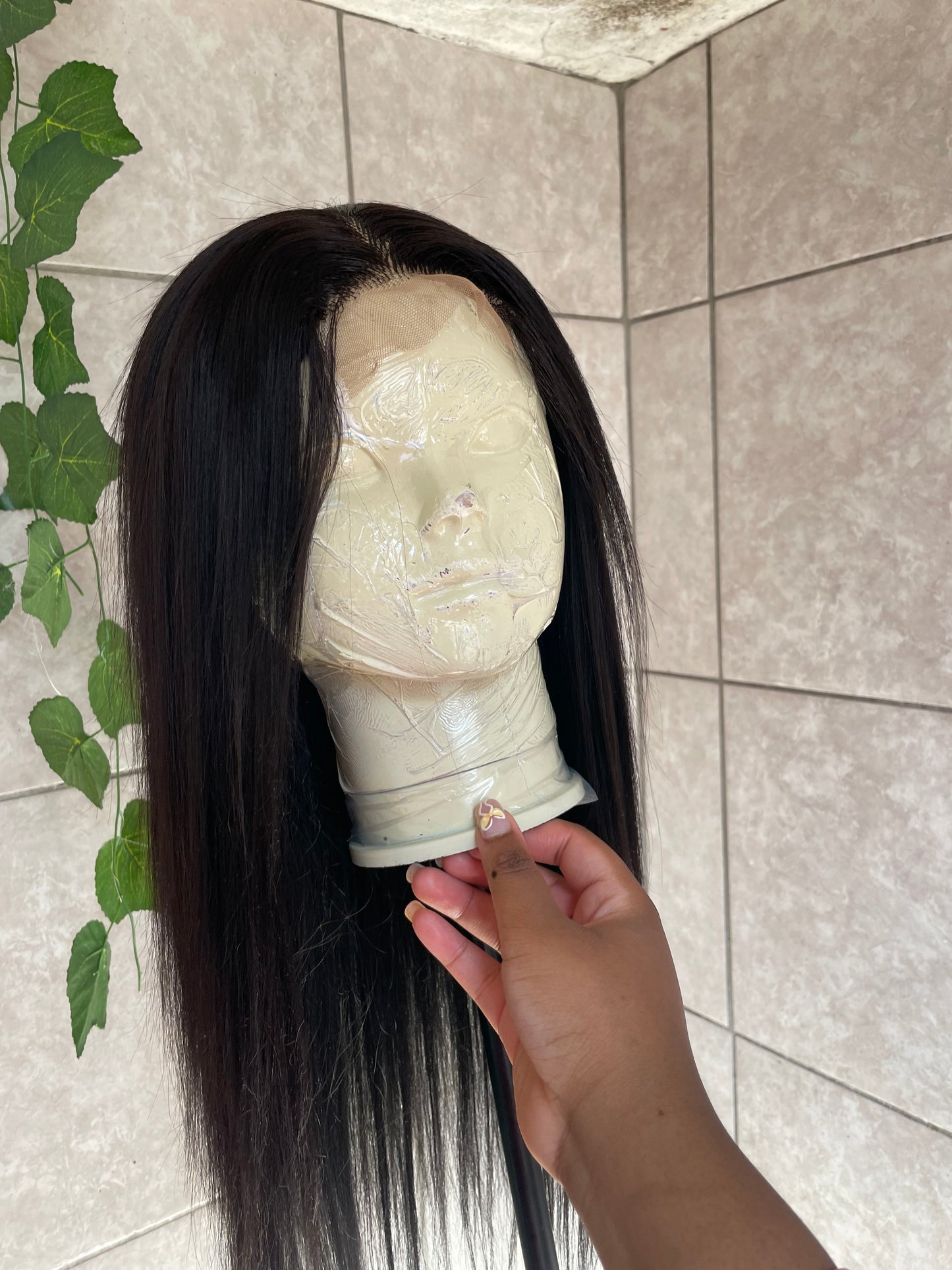 Black straight wig. 4x4 T-lace. 26 inches