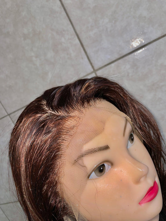 Wavy brown-blonde, blended, 28 inches, 13x4 T-lace.