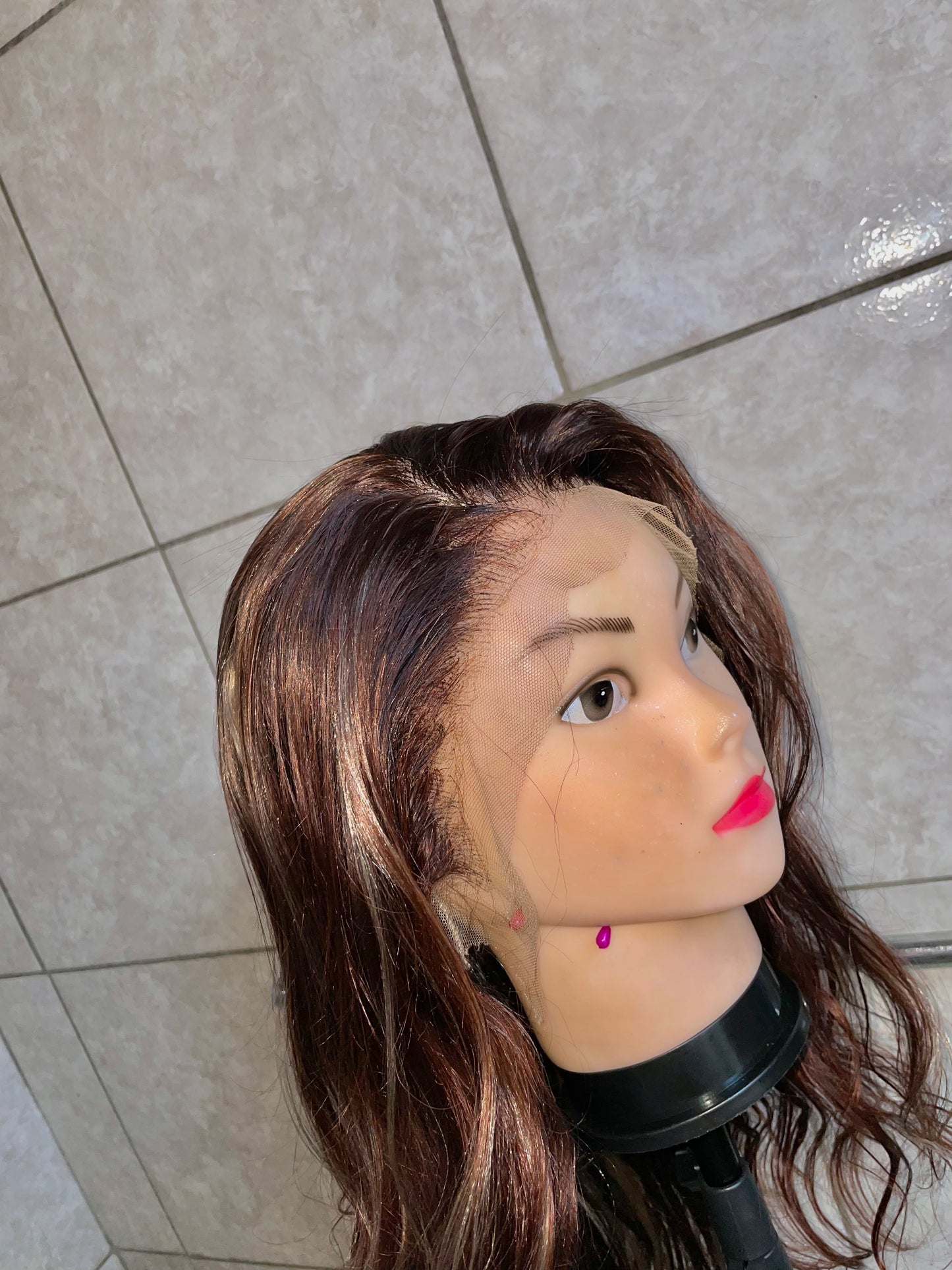 Wavy brown-blonde, blended, 28 inches, 13x4 T-lace.