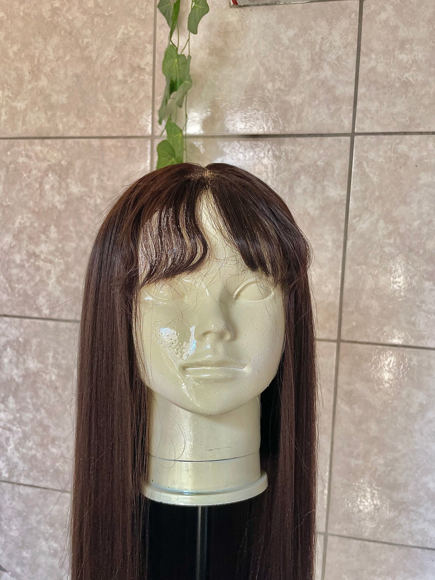 Wig combo, wig 1- Wavy black wig with a 4x4 closure, 26 inches human hair blended.
Wig 2- dark brown 4x4 T lace with bangs, 26 inches human hair blended.