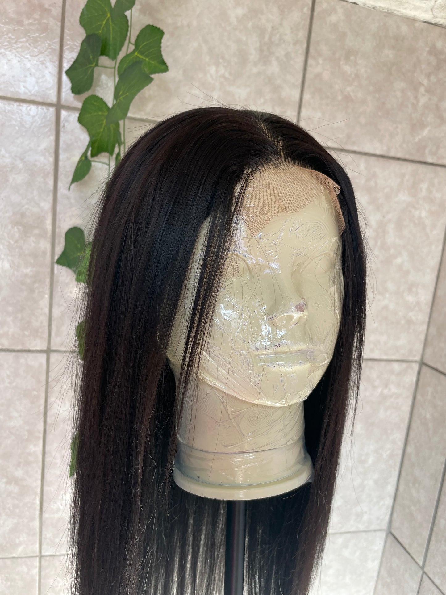 Black straight wig. 4x4 T-lace. 26 inches